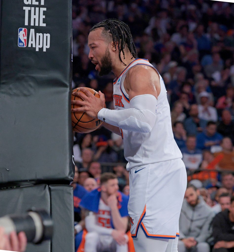Knicks guard Jalen Brunson #11 reacts under the basket during the second quarter.