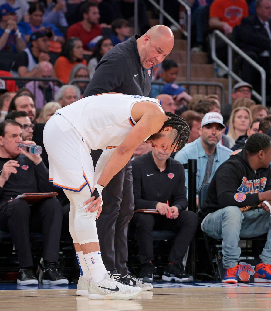 Knicks assistant Rick Brunson speaks to his son Jalen during the Game 7 loss.
