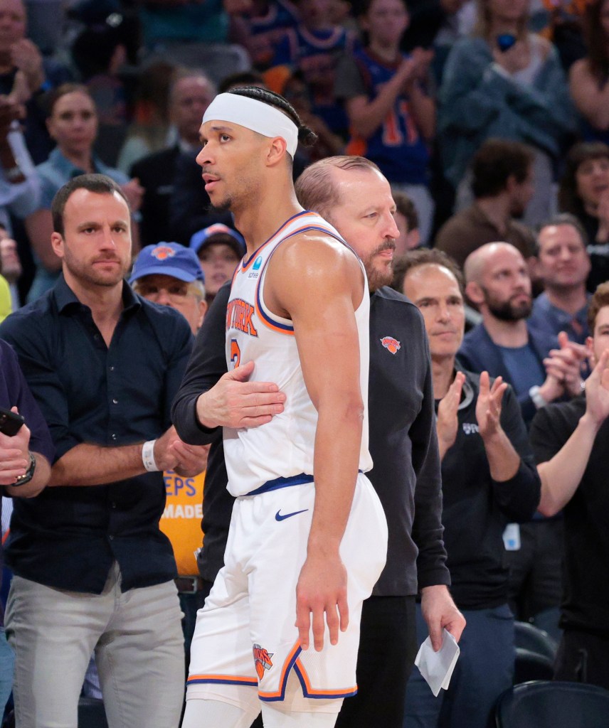 Josh Hart is greeted by Knicks coach Tom Thibodeau as he fouls out during the fourth quarter of Game 7.