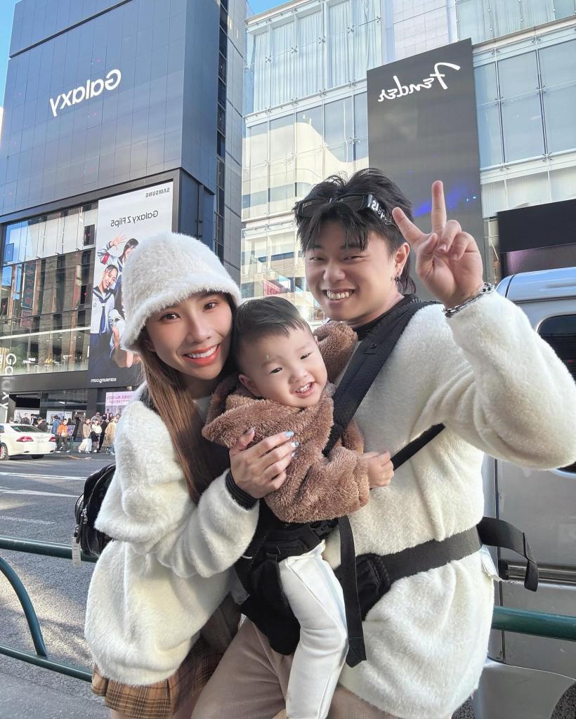 Jasmine Yong and Lim Kong Wang holding their son, Enzo