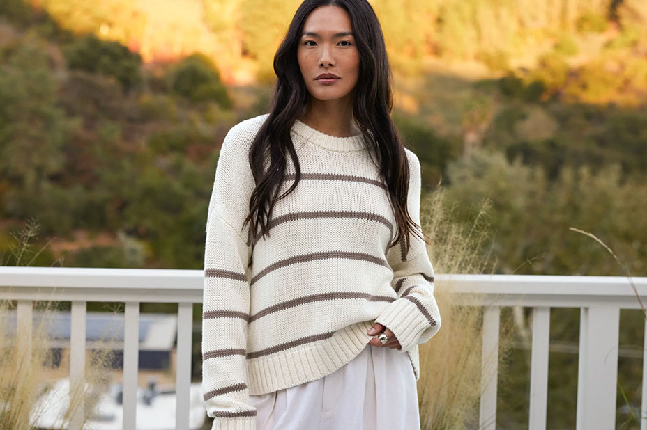 Ali Wong standing on a balcony