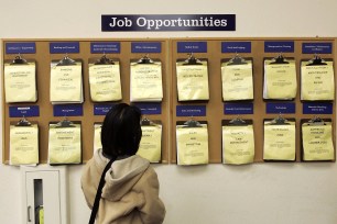 Job seeker looks at openings