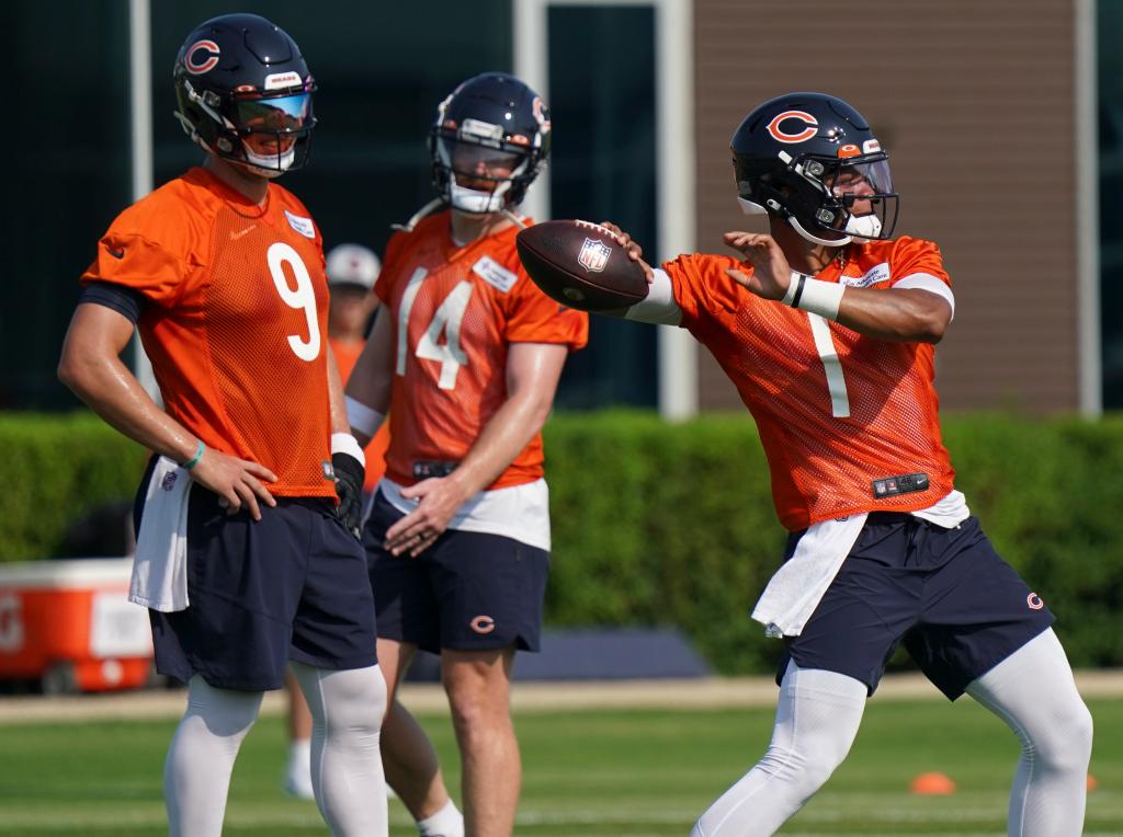 Justin Fields apparently had issues taking advice from his old teammates Nick Foles [left] and Andy Dalton [middle]. 