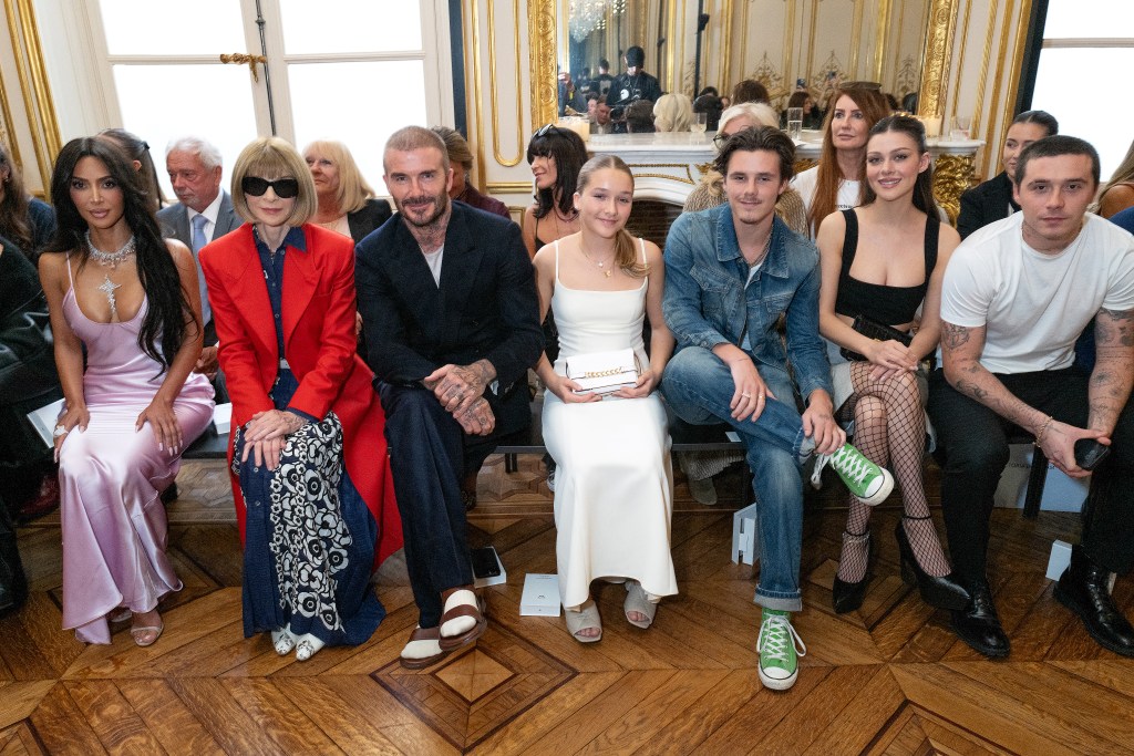 Kim Kardashian, Anna Wintour, David Beckham, Harper Beckham, Cruz Beckham, Nicola Peltz Beckham and Brooklyn Beckham at the Victoria Beckham fashion show during Paris Fashion Week 2023