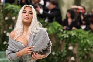 Kim Kardashian poses at the Met Gala, an annual fundraising gala held for the benefit of the Metropolitan Museum of Art's Costume Institute with this year's theme 'Sleeping Beauties: Reawakening Fashion' in New York City, New York, U.S., May 6, 2024