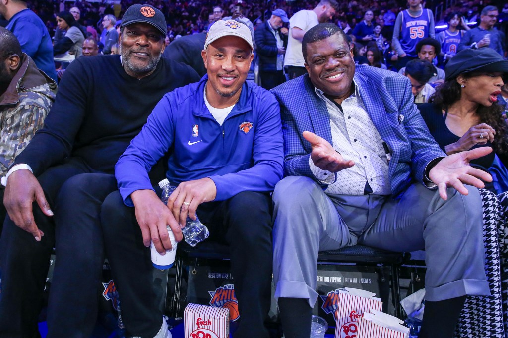 Bernard King (r.) is pictured with Larry Johnson (l.) and John Starks (c.) during the Knicks' April 20 game against the 76ers.