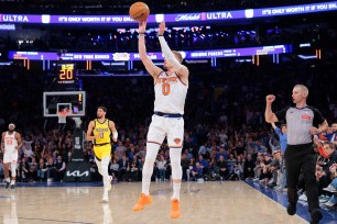 Donte DiVincenzo shoots a 3-pointer during the Knicks' Game 1 win against the Pacers.