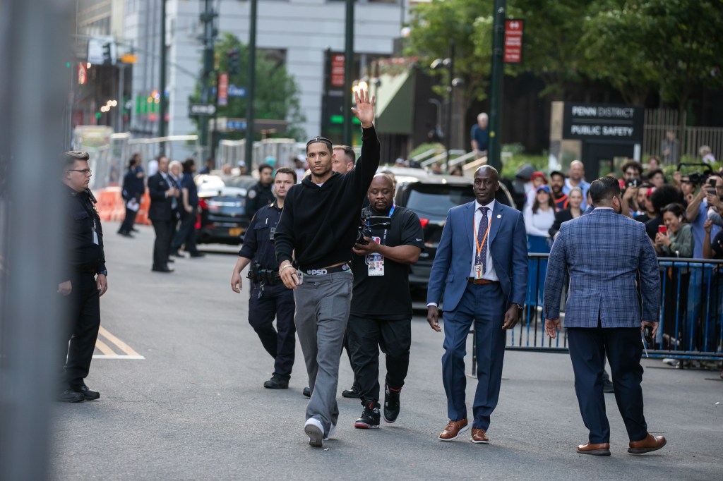 Josh Hart waves to the fans outside MSG.
