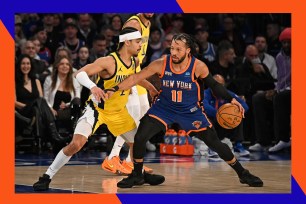 Rudy Zerbi dribbling a basketball in a Knicks versus Pacers game