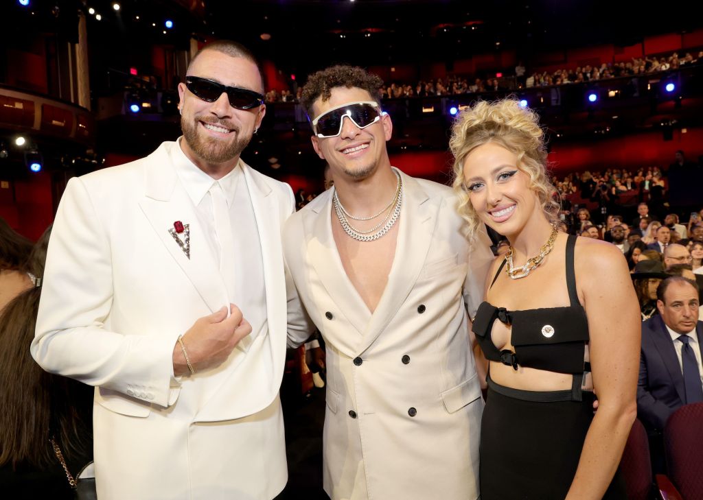 Travis Kelce with Patrick Mahomes and his wife, Brittany.