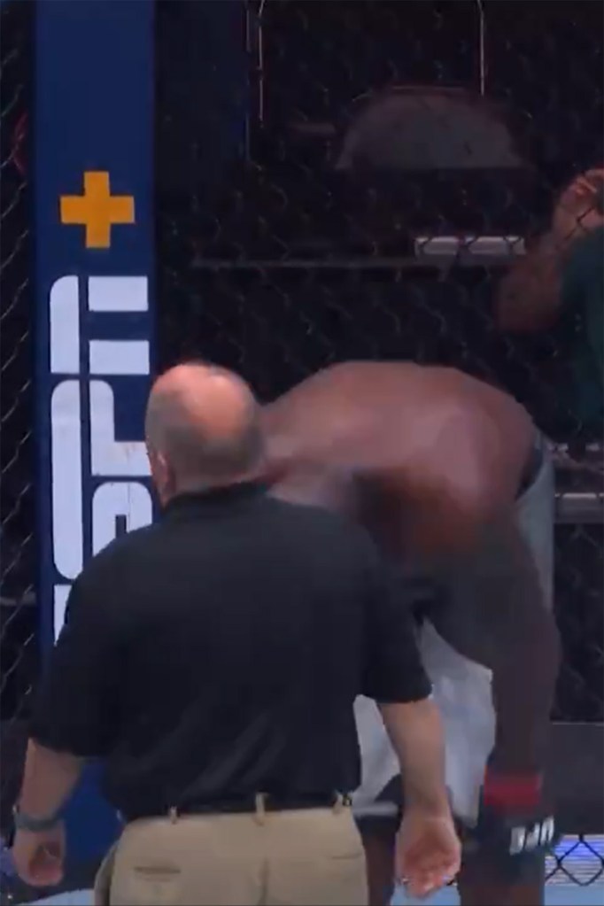 Derrick Lewis removes his shorts after winning a fight Saturday night.