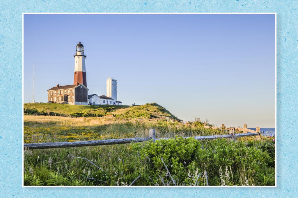 A lighthouse on a hill with Montauk Point Light in the background