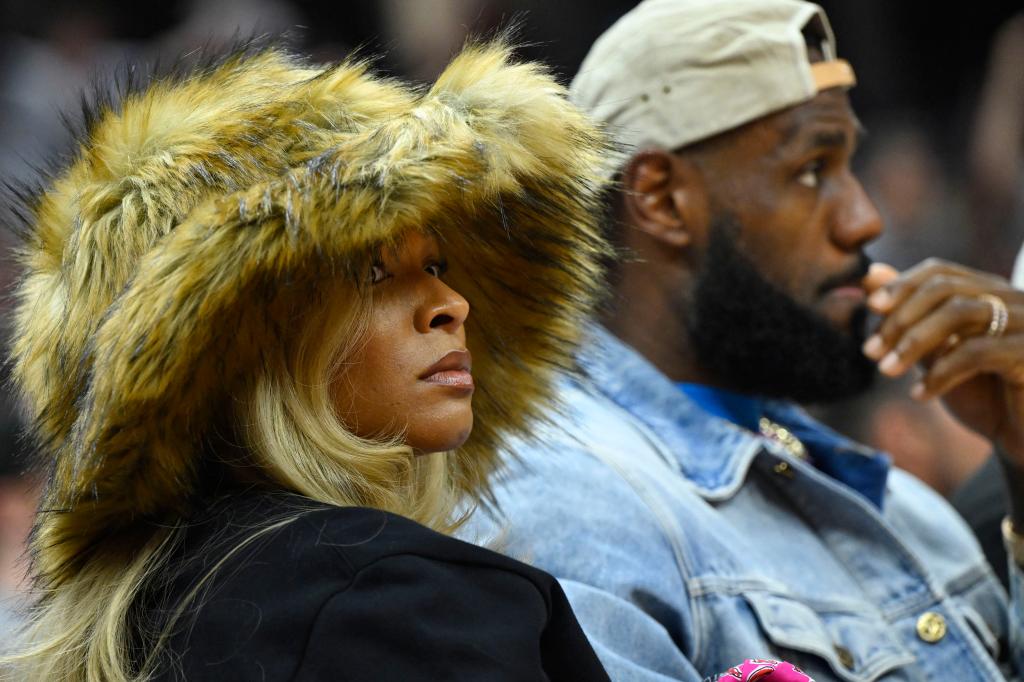 LeBron James (r.) and his wife Savannah (l.) in Cleveland at the Cavaliers-Celtics playoff game on Monday.