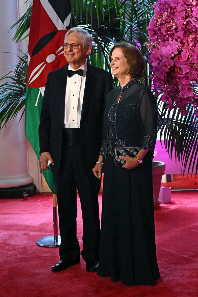 US Attorney General Merrick Garland (L) and Lynn Rosenman Garland arrive at the Booksellers Room of the White House on the occasion of the State Dinner with the Kenyan president at the White House in Washington, DC, on May 23, 2024