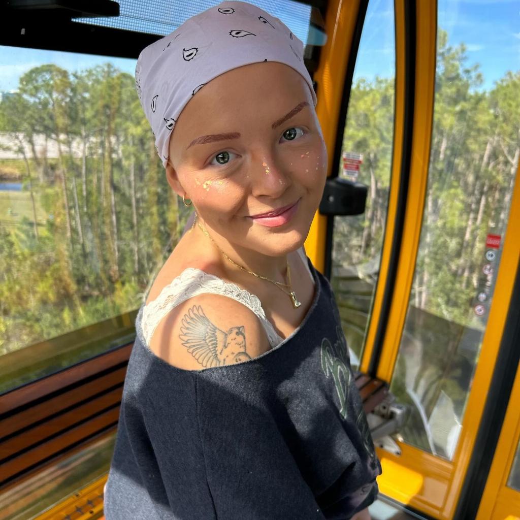 Maddy Baloy, a TikToker in a white bandana, who touched millions with her terminal cancer journey