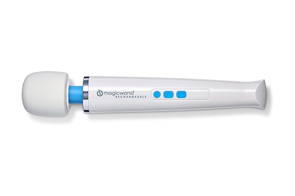 A white device with blue buttons, known as a magic wand
