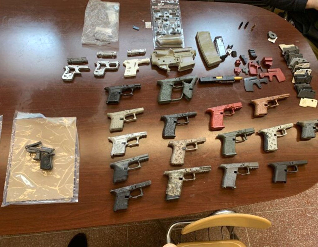 The pile of guns recovered from Guerrero's home.
