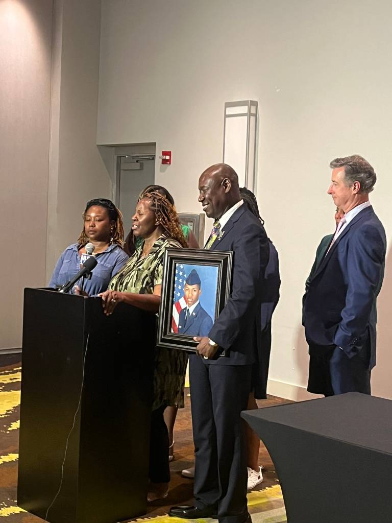 Meka Fortson, Fortson's mother, speaks about the shooting death of her son attorneys Ben Crump and Brian Barr look on.