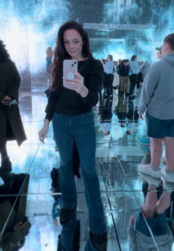 Alicia Gaeta takes a selfie in a mirror at Mercer Labs. 