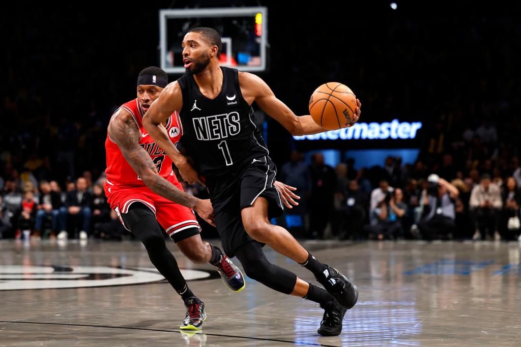 Brooklyn Nets forward Mikal Bridges (1) drives to the basket against Chicago Bulls forward Torrey Craig (13) during the second half at the Barclays Center. Friday, March 29, 2024 in Brooklyn, N.Y. The Brooklyn Nets won 125-108. 