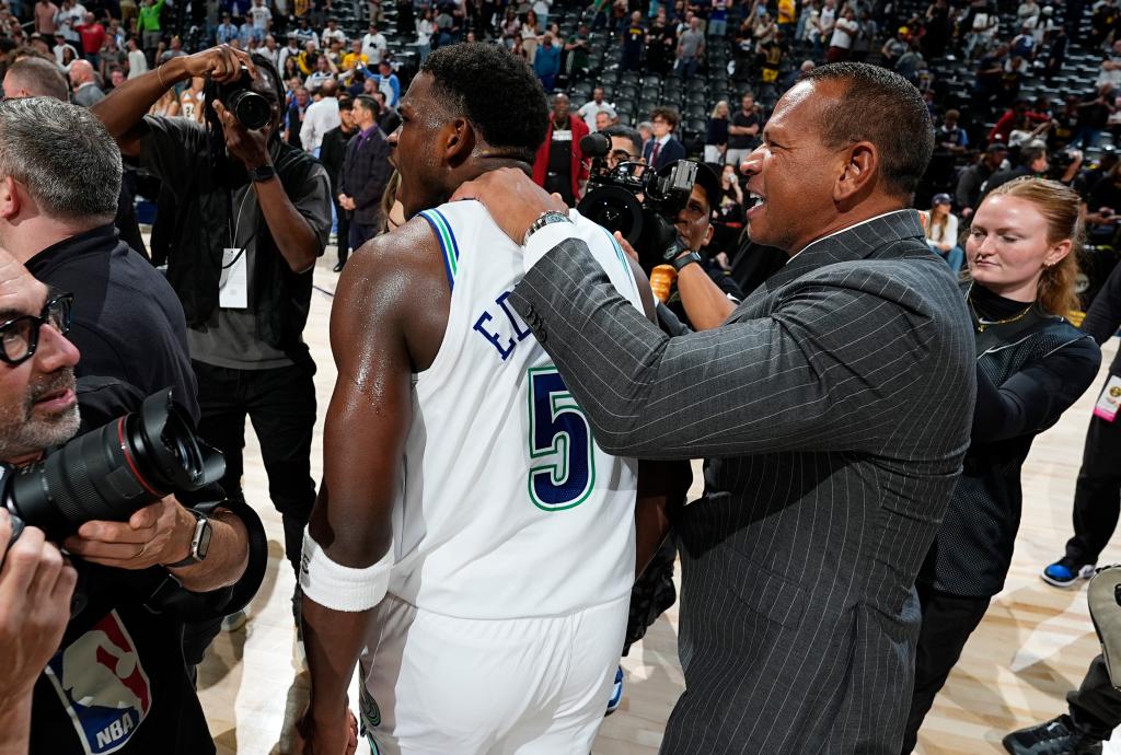 Alex Rodriguez celebrates with Timberwolves star Anthony Edwards after a win over the Nuggets on Sunday night.
