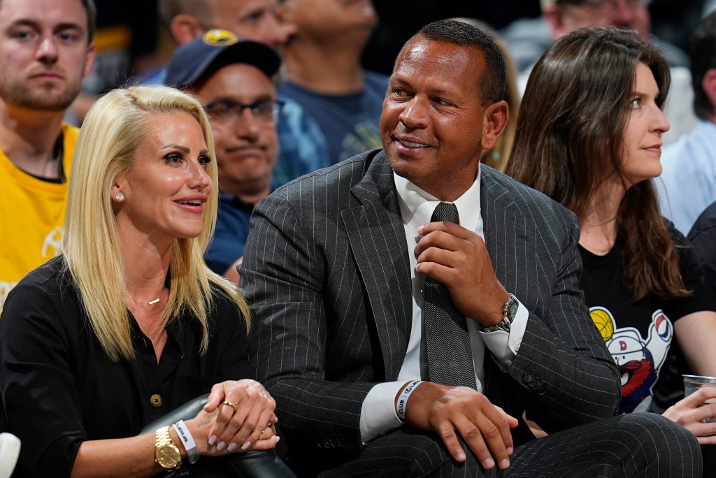 Jaclyn Cordeiro and Alex Rodriguez watch the Timberwolves' Game 7 win against the Nuggets on May 19, 2024.