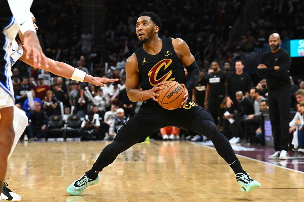 Donovan Mitchell #45 of the Cleveland Cavaliers handles the ball against the Orlando Magic during the third quarter in Game Seven of the Eastern Conference First Round Playoffs at Rocket Mortgage Fieldhouse on May 05, 2024 in Cleveland, Ohio.