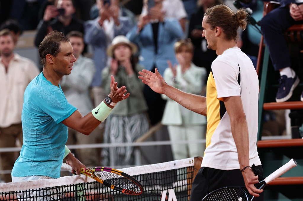 Rafael Nadal shakes hands with Alexander Zverev following their match Monday.
