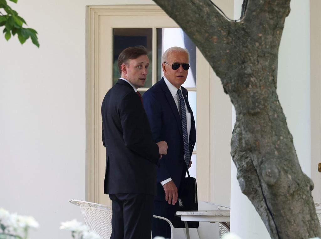 National Security adviser Jake Sullivan accompanies U.S. President Joe Biden following a visit to the Office of the Director of National Intelligence as they they return to the White House Washington, U.S., July 27, 2021.