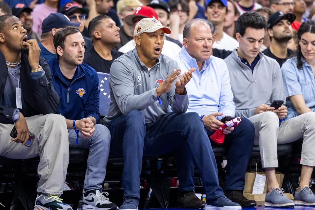 Knicks legend John Starks sitting courtside in Philadelphia on Sunday.