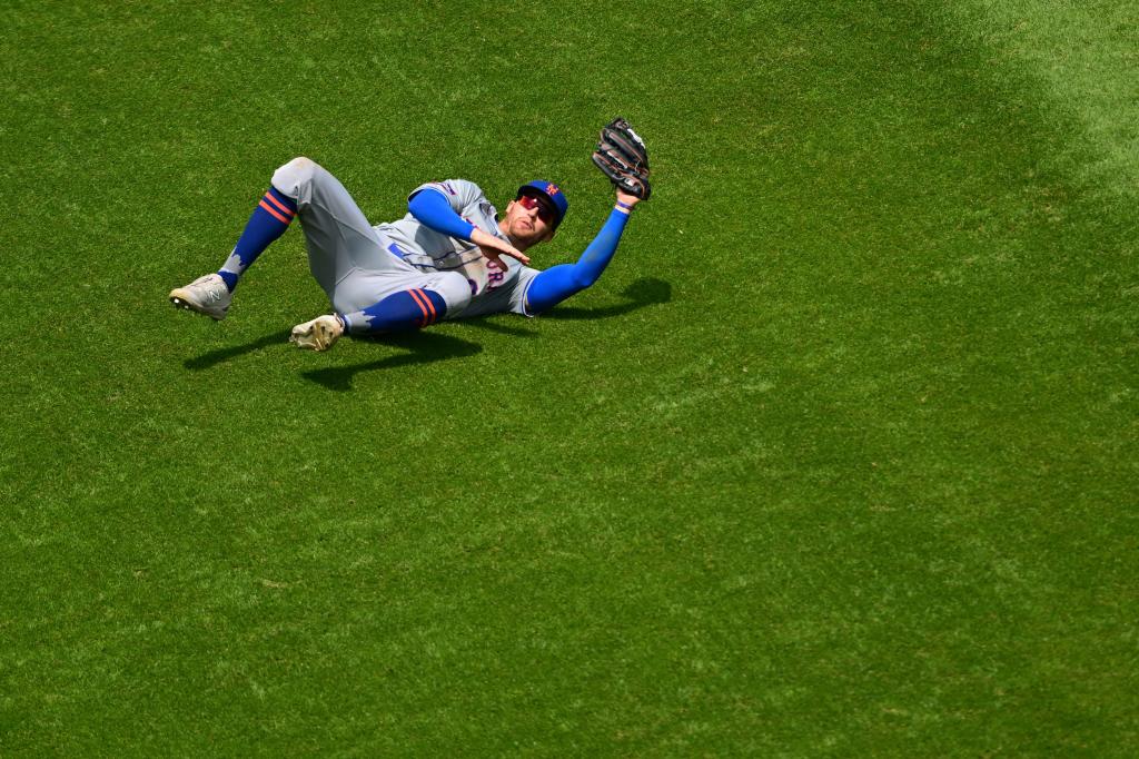 Mets left fielder Brandon Nimmo catches a ball hit by Cleveland Guardians' Tyler Freeman during the fourth inning