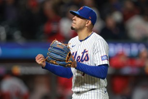 New York Mets starting pitcher, Jose Butto, reacting during a game against the St. Louis Cardinals at Citi Field