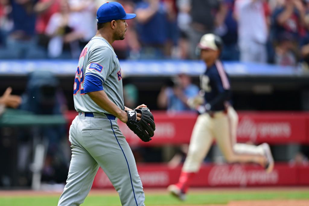 Mets starting pitcher Jose Quintana waits for Cleveland Guardians' Andres Gimenez to run the bases after hitting a three-run home run during the sixth inning