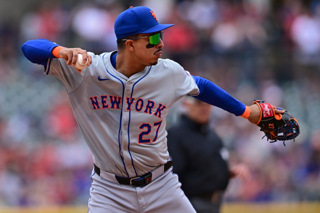 Mets third baseman Mark Vientos throws to first base to get out Cleveland Guardians' Johnathan Rodriguez during the fifth inning