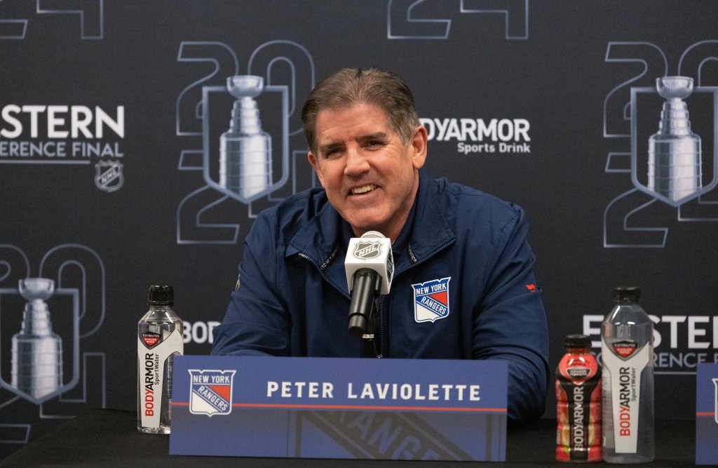 Rangers head coach Peter Laviolette speaking during a press conference at the Rangers practice facility.
