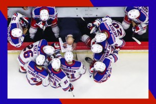 A group of New York Rangers hockey players in a game