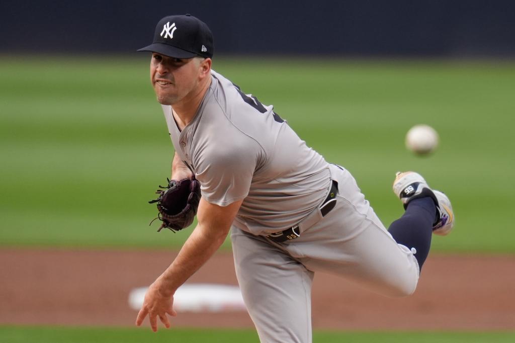 Yankees starting pitcher Carlos Rodon works against a San Diego Padres batter during the first inning