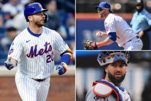 The Mets' Pete Alonso watches a ball in play; Jeff McNeil fields the ball; Tomas Nido looks on