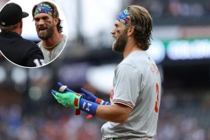 Bryce Harper was ejected following his strikeout in the first inning of the Phillies' game Friday.