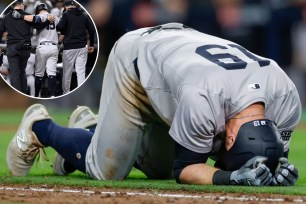 Jon Berti collapses to the ground after suffering a left calf injury (inset) while running down the first base line during the ninth inning of the Yankees' 8-0 win over the Padres.