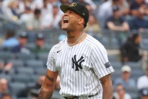 Luis Gil, who struck out 14, lets out a yell after closing out the sixth inning in the Yankees' 6-1 win over the White Sox.