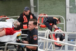 Man in stretcher after jumping off Brooklyn Bridge