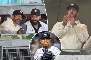 Aaron Rodgers take in the Yankees game on Monday.