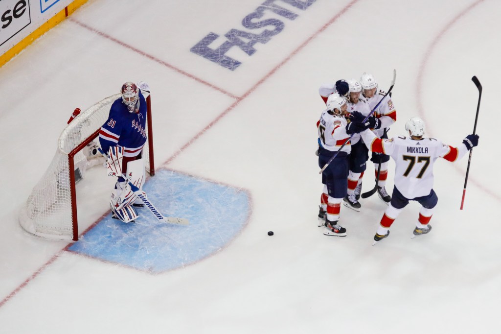 Carter Verhaeghe #23 of the Florida Panthers celebrates with teammates after scoring goal in the third period against Igor Shesterkin #31 of the New York Rangers in Game One of the Eastern Conference Final of the 2024 Stanley Cup Playoffs at Madison Square Garden on May 22, 2024 in New York City.