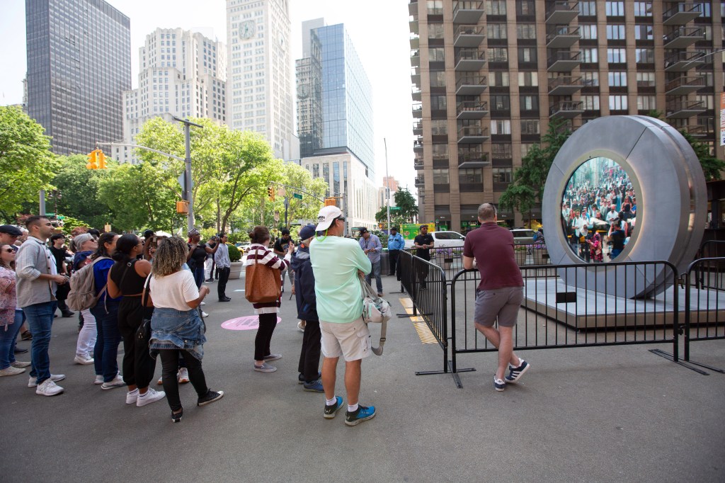 People at he Portal located next to the Flatiron Building in Manhattan