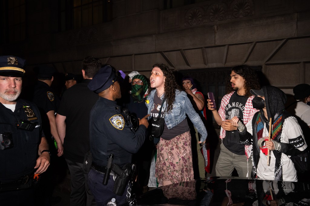 Several members of each group rushed up to one another and engaged in some mild pushing on the street until the NYPD stepped in before it escalated. 