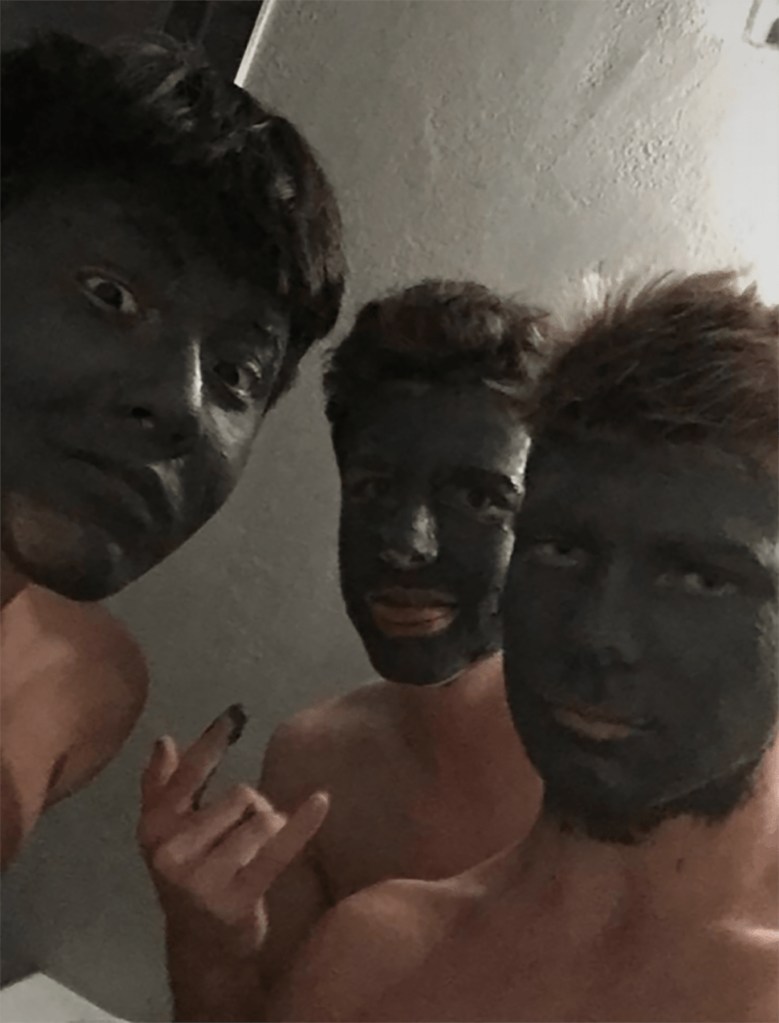 Three shirtless teens posing together while wearing green face masks, included in a lawsuit