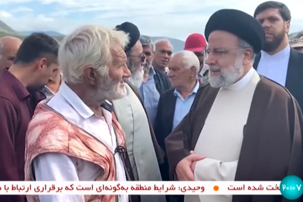 Ebrahim Raisi talks to locals in Azerbaijan.