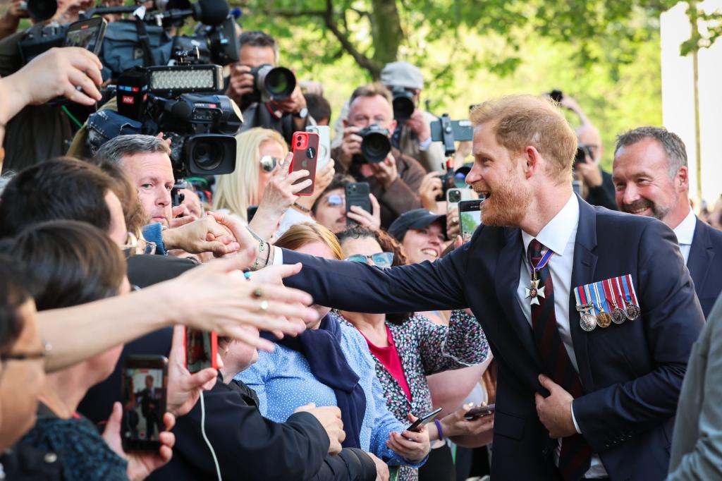 Prince Harry, The Duke of Sussex, greeting the public at the 10th Anniversary Service of The Invictus Games Foundation in London, England.