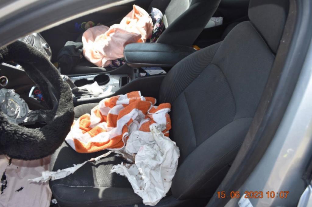 fake emergency airbags deployed in a June frontal collision, causing a blast that “shot metal and plastic shrapnel throughout" the car, her family alleges.